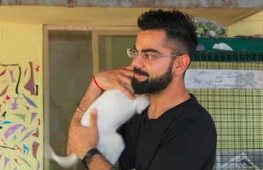WATCH: Despite busy IPL schedule, Kohli takes time out to visit animal shelter 
