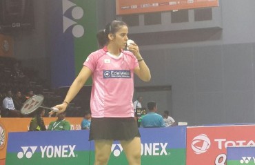 Defending champion Srikanth crashes out while Saina enters RD 2 of India SS