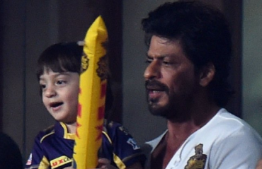 KKR co-owner SRK enjoys the game with son AbRam at Eden Gardens